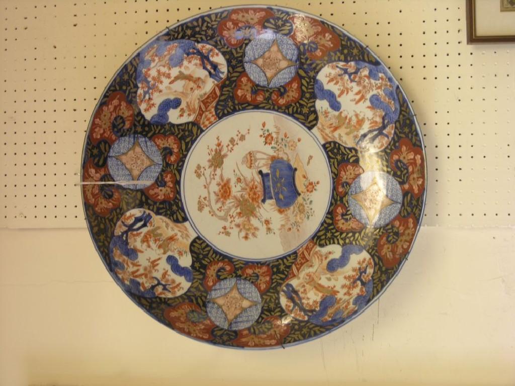 Appraisal: A large late th century Imari charger painted with a