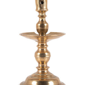 Appraisal: A Dutch Brass Heemskerk Candlestick Mid th Century Height inches