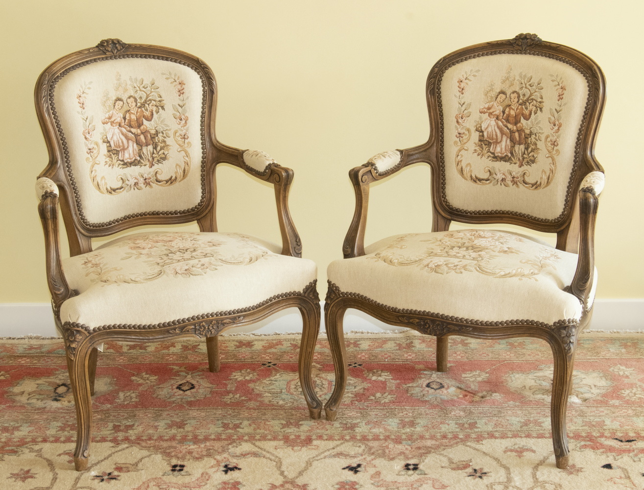 Appraisal: PAIR OF ARMCHAIRS A matching pair of French style arm