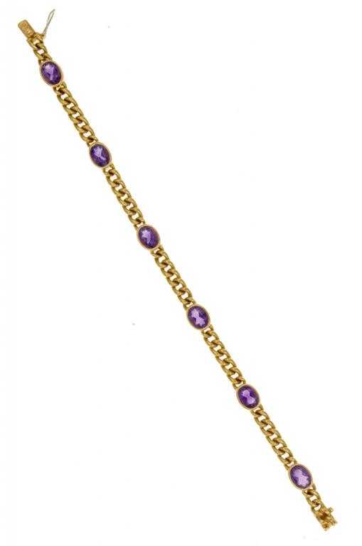 Appraisal: A GOLD BRACELET of curb links with six oval amethyst