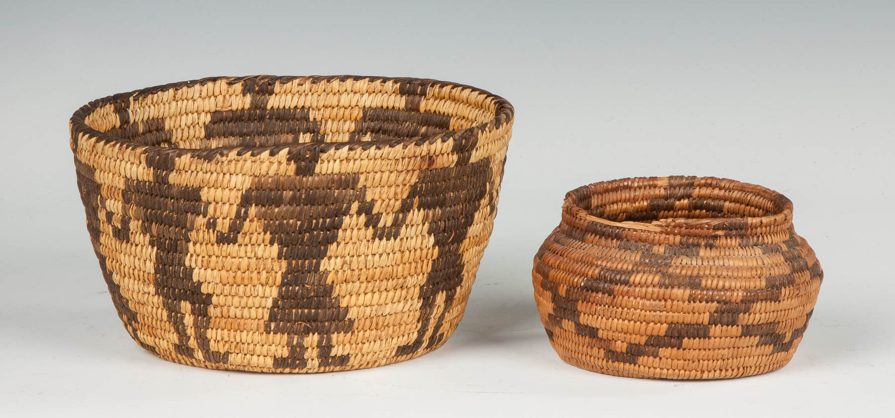 Appraisal: Two Native American Baskets with Figures