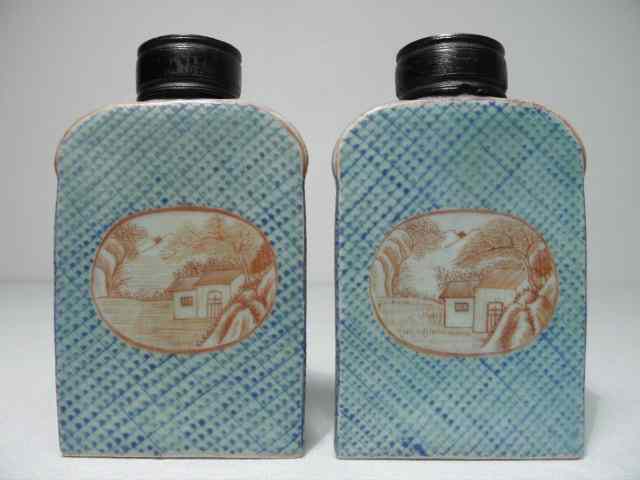 Appraisal: Pair Chinese ceramic tea bottles Iron red hand painted landscape