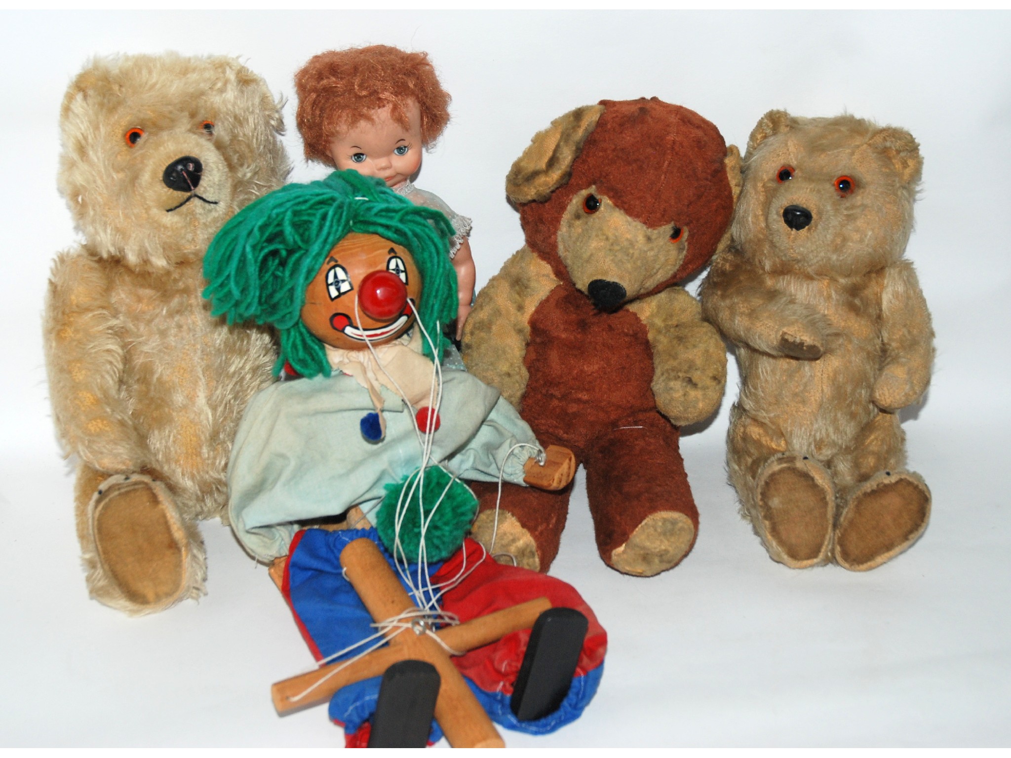 Appraisal: Three various teddy bears doll and puppet