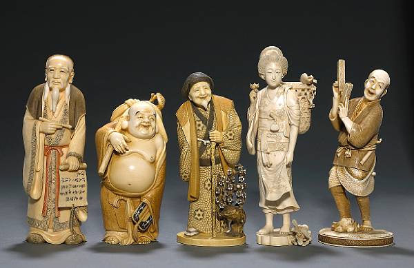 Appraisal: A group of five ivory okimono th Century The first