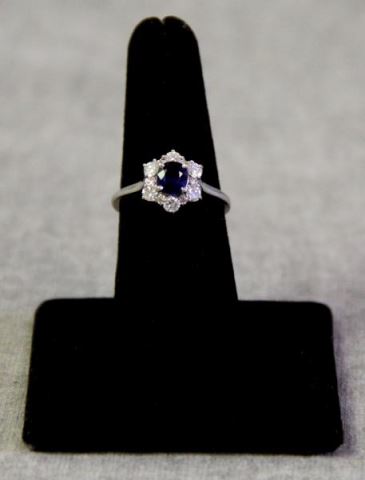 Appraisal: JEWELRY Platinum Diamond and Sapphire Ring Cluster or floral form