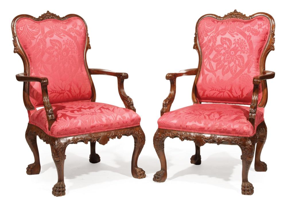 Appraisal: Pair of English Rococo-Style Carved Mahogany Armchairs foliate crest shaped