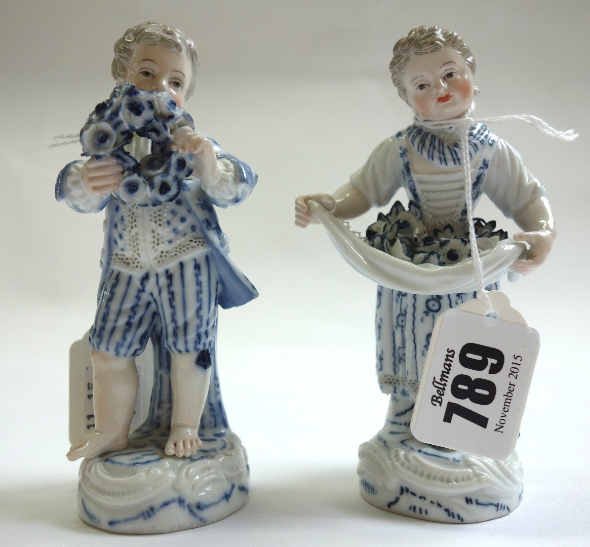 Appraisal: A pair of Meissen porcelain figures th century both decorated