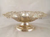 Appraisal: A sterling silver embossed and pierced dish on stand Sheffield