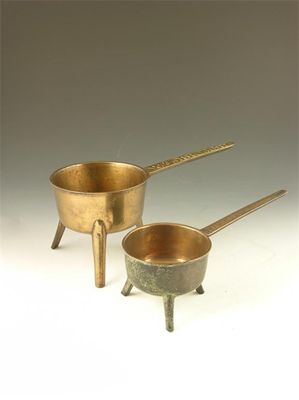 Appraisal: Two th century bell metal skillets the handles cast 'WASBOROUGH'