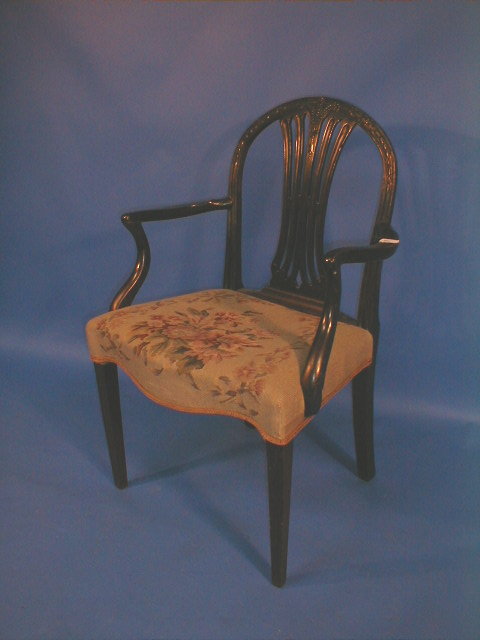 Appraisal: A thC mahogany carver chair in the Hepplewhite manner with