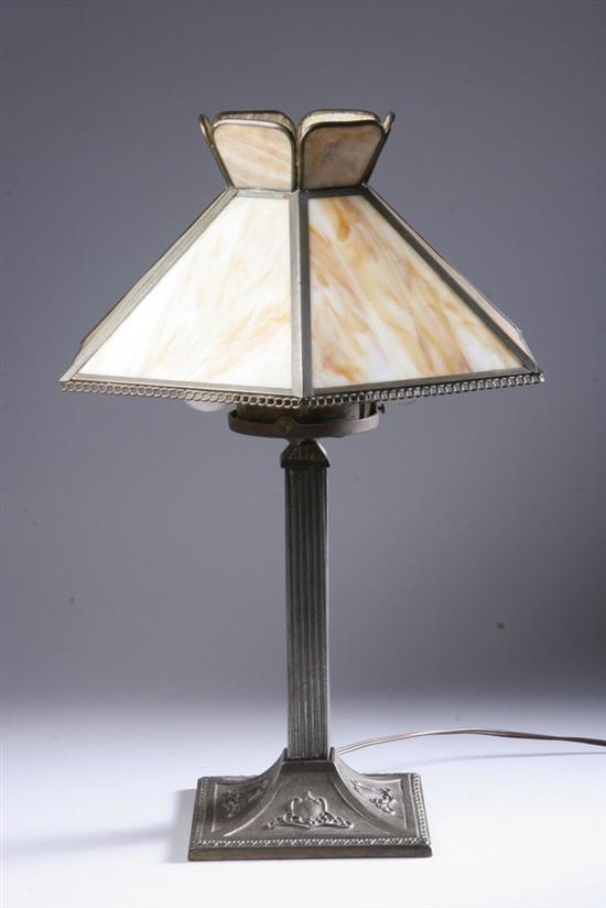 Appraisal: MISSION-STYLE PATINATED METAL AND SLAG GLASS TABLE LAMP th century