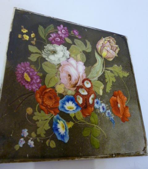 Appraisal: A SQUARE EARTHENWARE TILE PANEL mid th century painted in