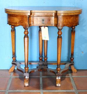 Appraisal: Baroque style flip top occasional table having a marquetry decorated