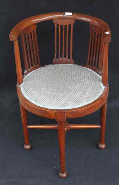 Appraisal: A PAIR OF MAHOGANY HORSE SHAPED BACK TUB CHAIRS with