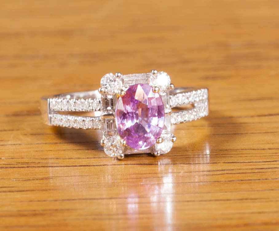 Appraisal: PURPLE SAPPHIRE DIAMOND AND FOURTEEN KARAT GOLD RING with AIGS