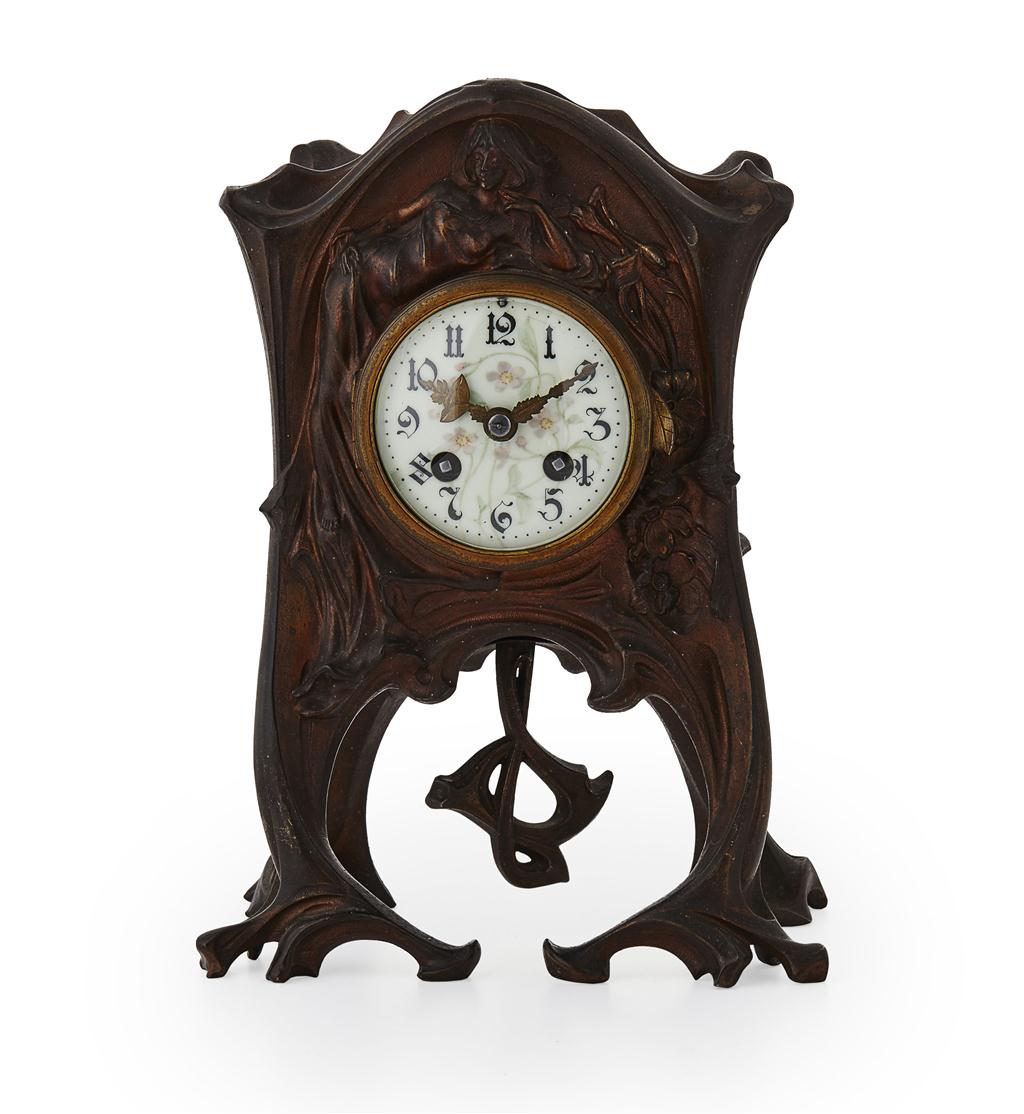 Appraisal: ART NOUVEAU PATINATED METAL MANTEL CLOCK CIRCA decorated with a