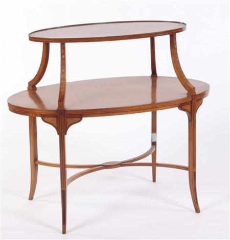 Appraisal: An Edwardian satinwood and rosewood crossbanded etagere of oval form