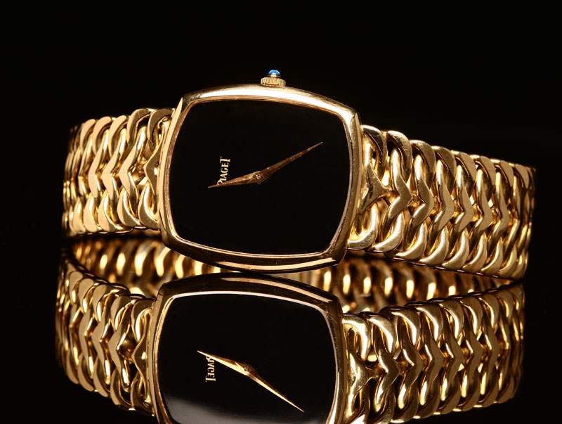 Appraisal: A gentlemen's Piaget K yellow gold wristwatch The black onyx