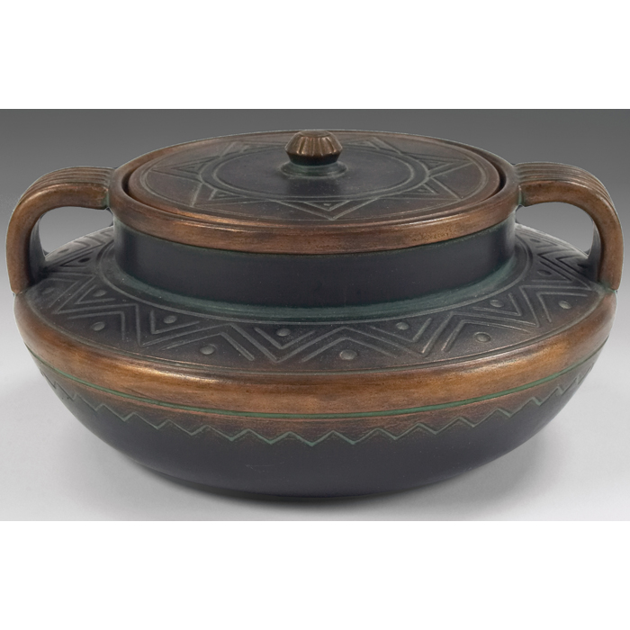 Appraisal: Norse Pottery covered bowl two-handled bowl covered in a copper