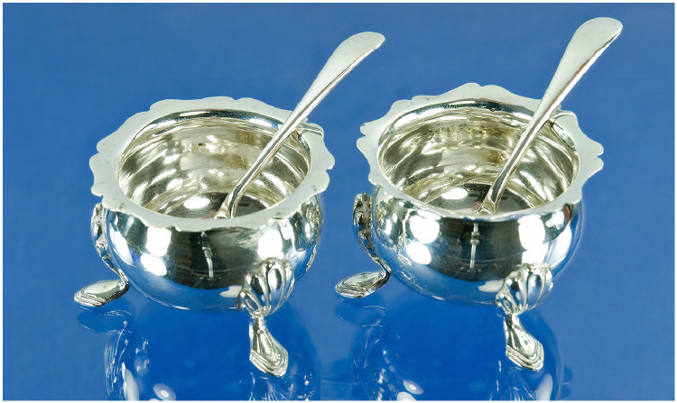 Appraisal: Pair of Silver Preserve Pots and Spoons shaped edge on