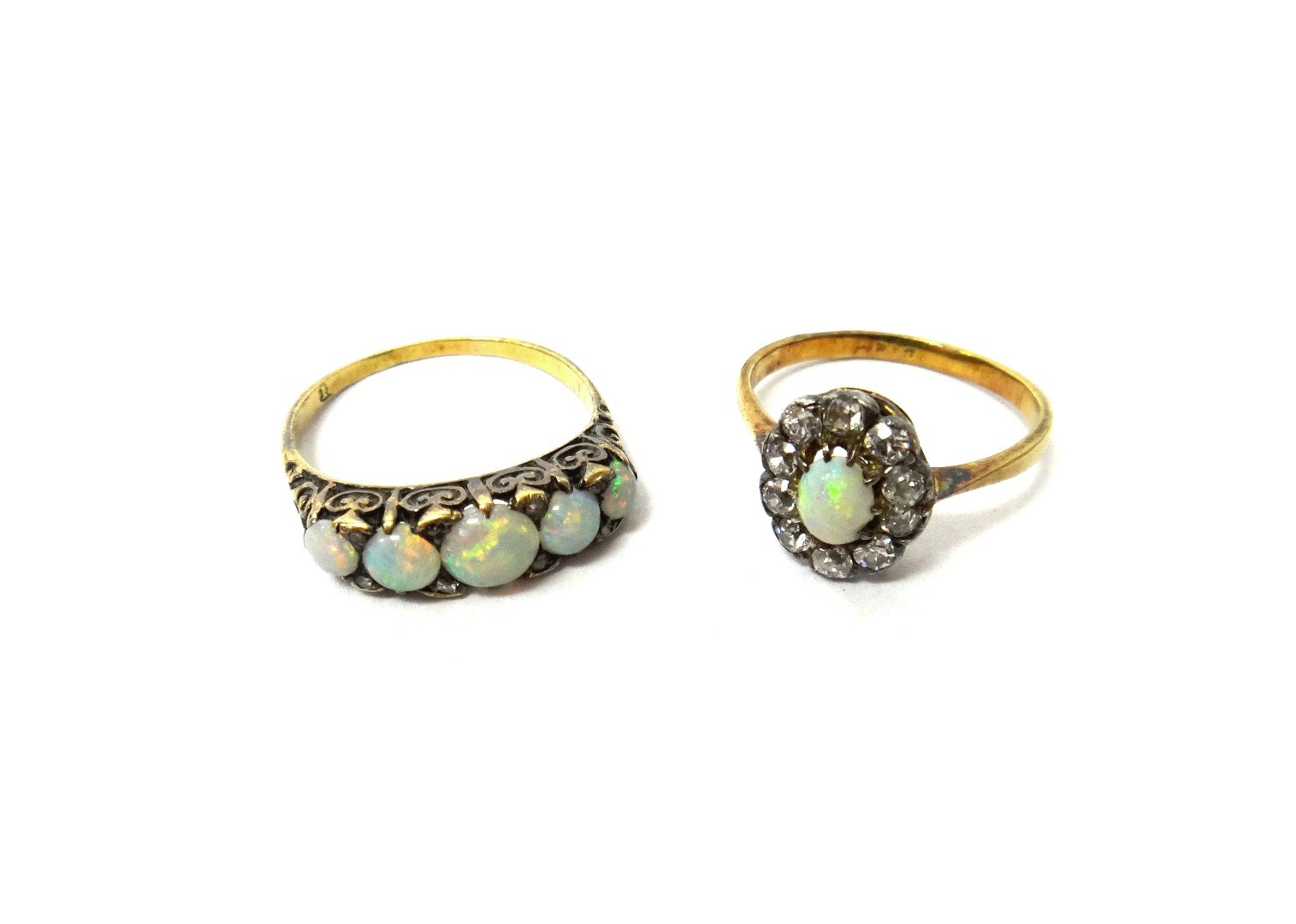 Appraisal: A gold opal and diamond set oval cluster ring ring