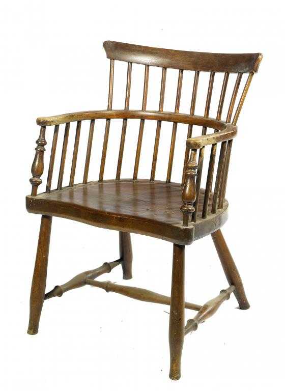 Appraisal: A VICTORIAN STAINED ASH COMB-BACK WINDSOR CHAIR PROBABLY LINCOLNSHIRE with