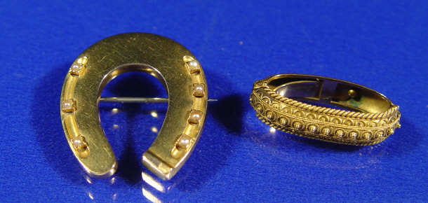 Appraisal: Gold and seed pearl horseshoe brooch and a ct gold