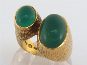 Appraisal: A s carat gold and green stone ring by Georg