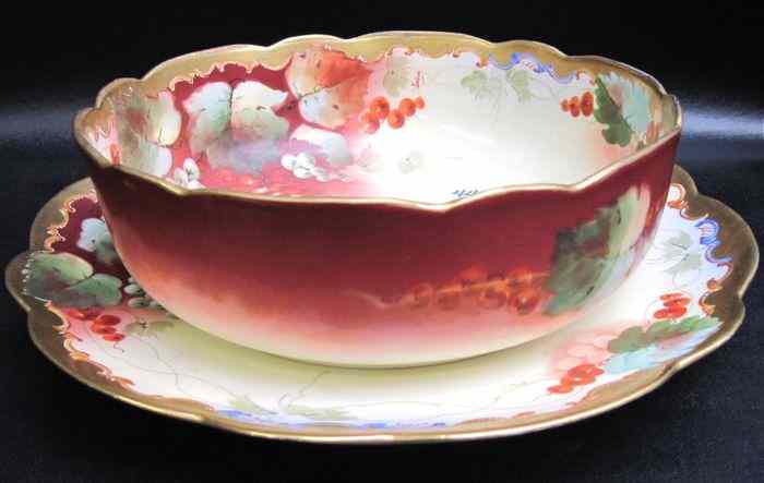 Appraisal: LIMOGES PORCELAIN SERVING BOWL AND PLATTER SET pieces artist signed