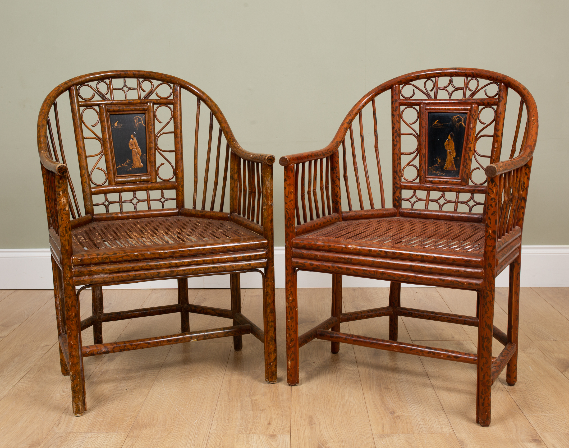 Appraisal: A pair of Chinese style painted bentwood and bamboo armchairs