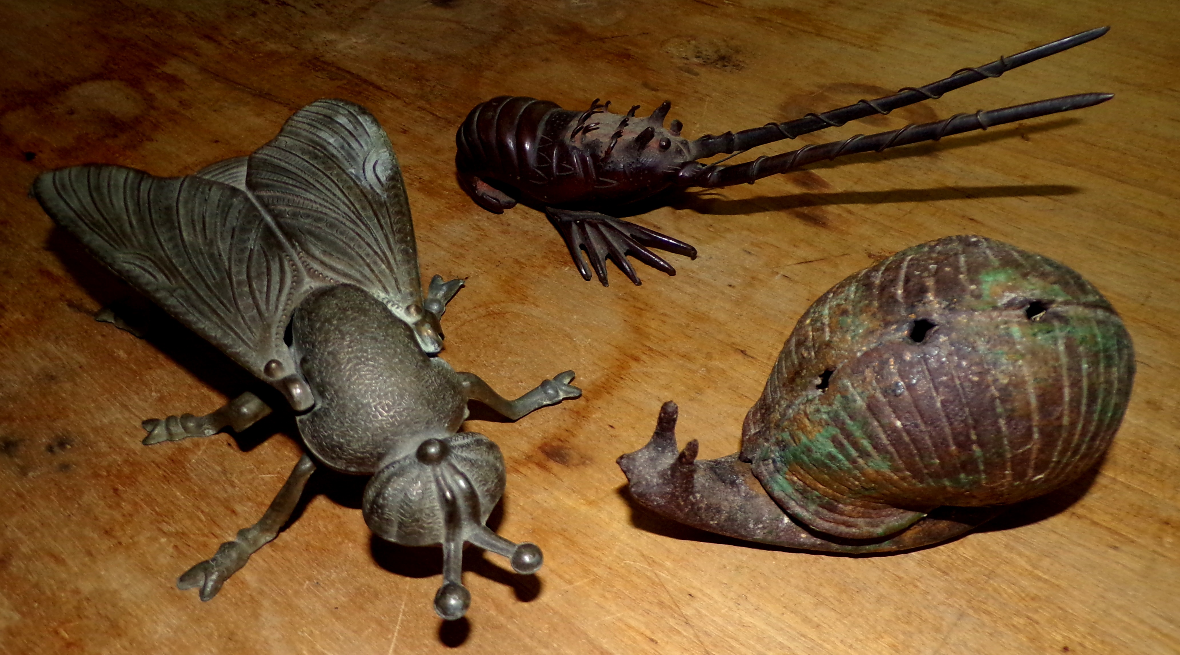 Appraisal: Three cast iron items- Fly from ashtray Grayfish and Snail