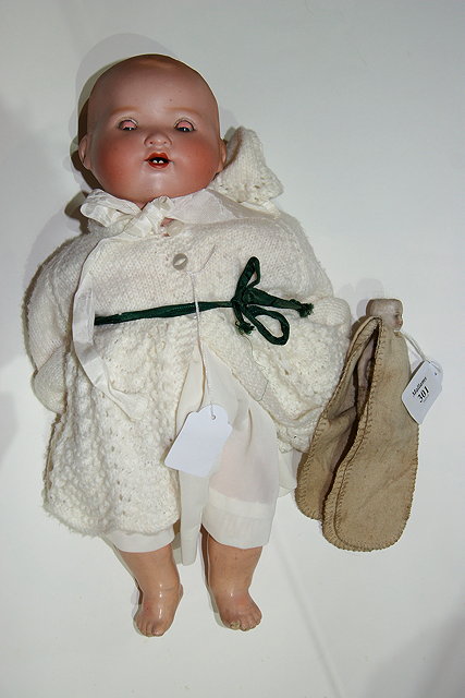 Appraisal: A GERMAN ARMAND MARSEILLE bisque headed doll impressed K to