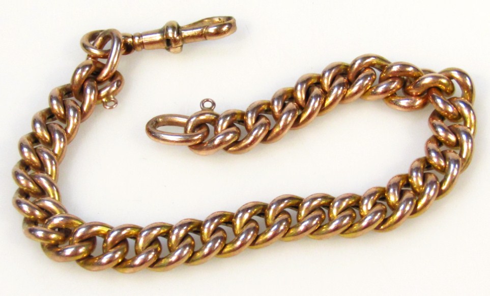 Appraisal: An heavy link bracelet with plain end and clasp yellow