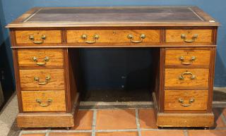 Appraisal: Edwardian burl mahogany kneehole desk Edwardian burl mahogany kneehole desk