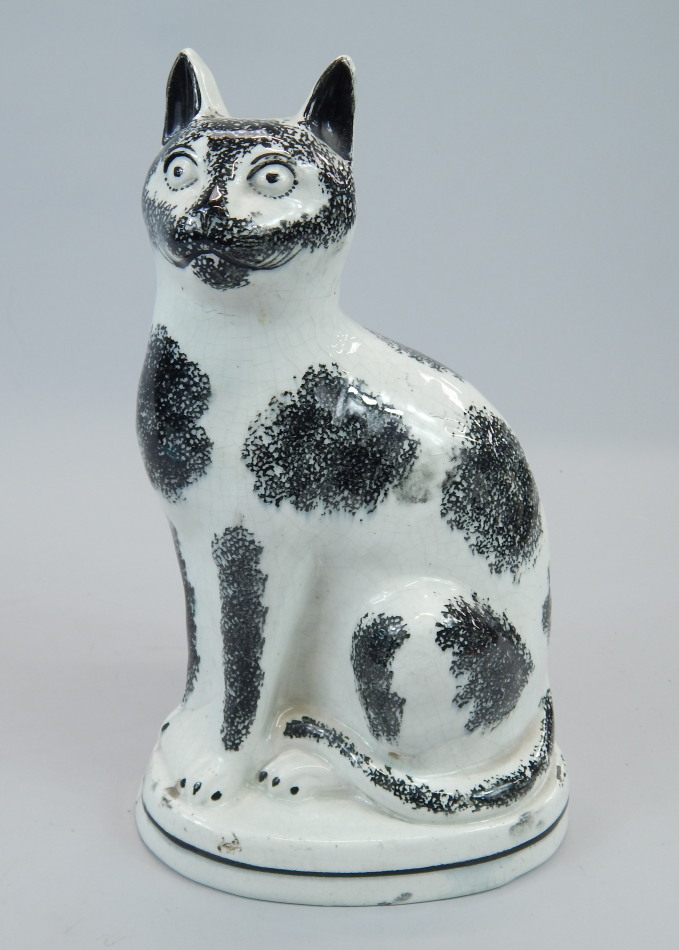 Appraisal: An unusual thC Staffordshire black and white model of a