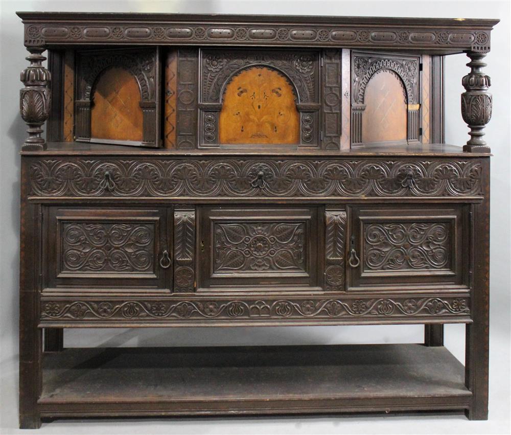 Appraisal: JACOBEAN STYLE CARVED AND INLAID OAK COURT CUPBOARD in two