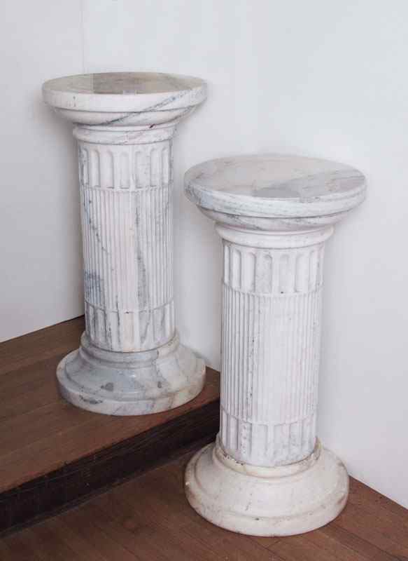 Appraisal: PAIR OF LARGE MARBLE COLUMNS White variegated marble separated in