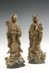 Appraisal: FIGURINES - Pair of parcel-gilt carved inkcake figures molded in