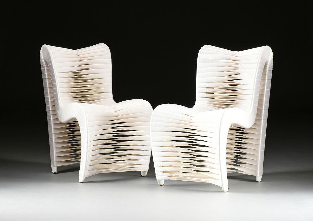 Appraisal: A PAIR OF SEATBELT WHITE DINING CHAIRS DESIGNER NUTTAPONG CHAROENKITIVARAKORN