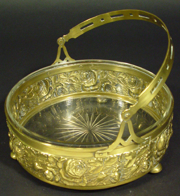 Appraisal: Brass Art Nouveau style bowl with cut glass liner the