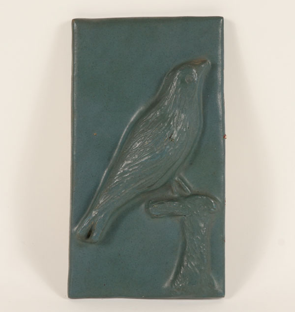 Appraisal: French 's art pottery tile plaque depicting a bird in