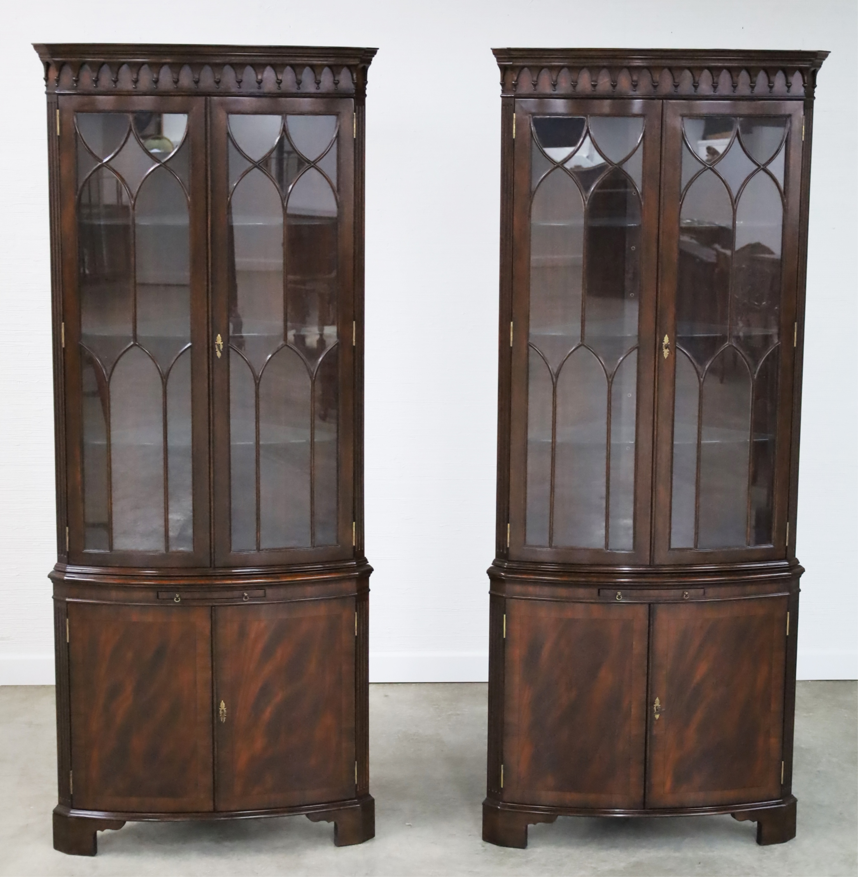 Appraisal: PR OF MAHOGANY BOW FRONT CORNER DISPLAY CABINETS Pair of