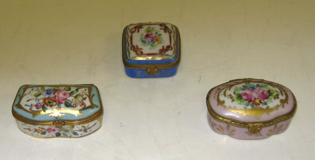 Appraisal: THREE FRENCH PORCELAIN BIBELOT BOXES Limoges various shape and ground