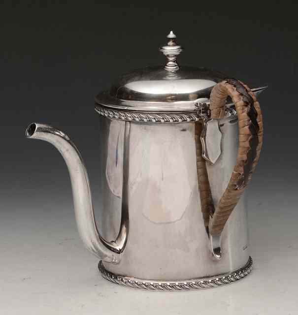 Appraisal: A SILVER DOUBLE SKINNED ARGYLE with two pouring spouts gadrooned