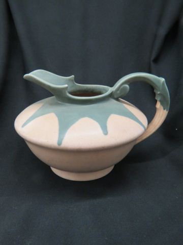 Appraisal: Roseville Pottery Carnelian Oversized Pitcher squat form pinkish blue glaze