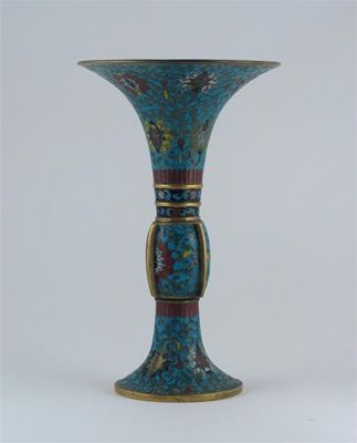 Appraisal: A Chinese cloisonn gu beaker decorated with scrolling lotus on