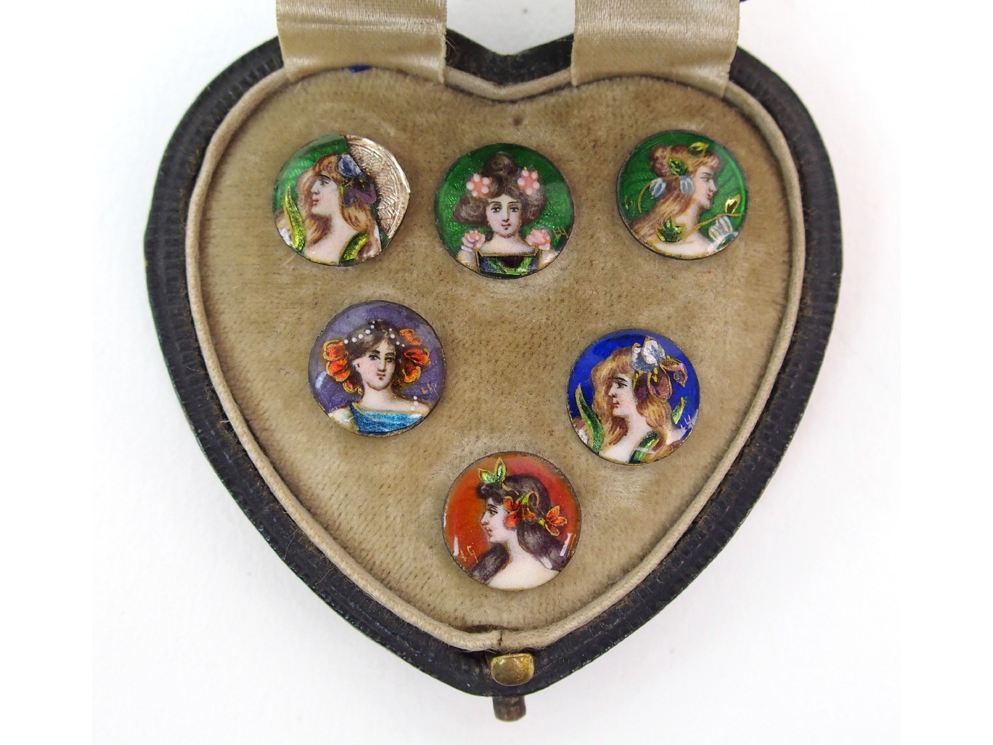 Appraisal: Six enamelled buttons in original caseeach with a portrait of