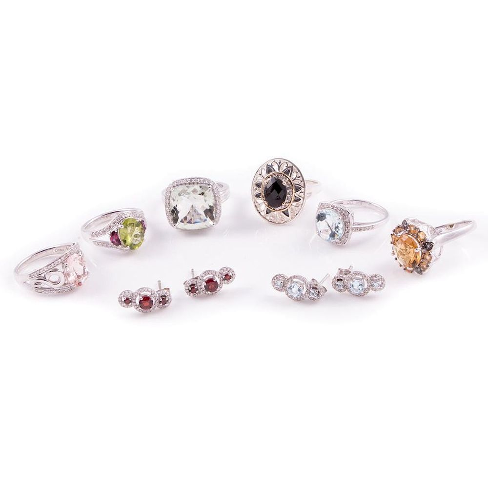 Appraisal: Gem-set diamond and sterling silver jewelry comprising rings and pairs