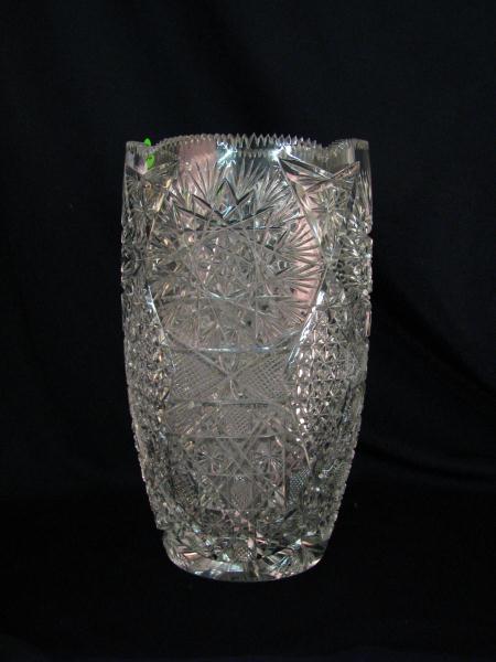 Appraisal: An '' cut glass vase with a saw-tooth top edge