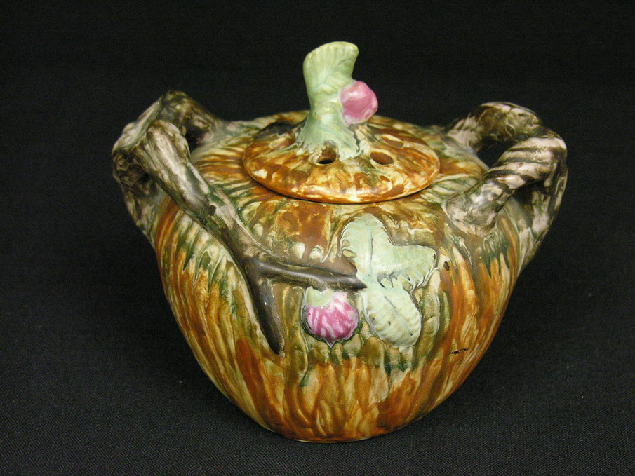 Appraisal: WELLER WARWICK JARDINIERE WITH FROG LID unusual flower frog lid